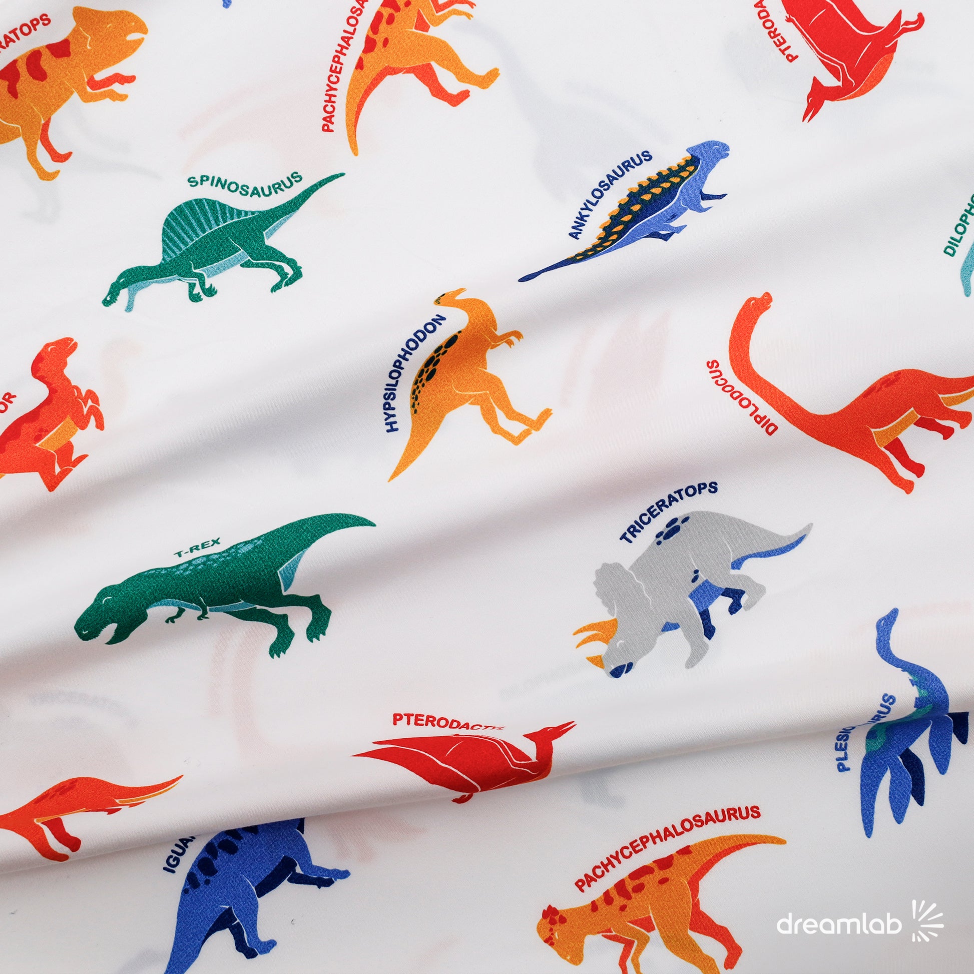 Sábanas Dreamlab con estampado de dinosaurios divertidos, hipoalergénicas, suaves y resistentes, para camas de niños y niñas.
